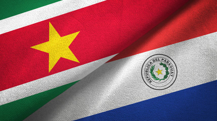 Suriname and Paraguay two flags textile cloth, fabric texture