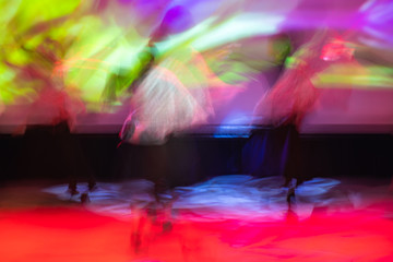 Beautiful movements in dance, shot on long exposure. Children ensemble. Moscow. Russia