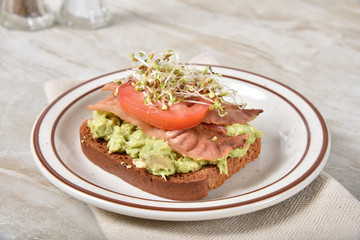Avocado toast with bacon