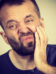 Man having tooth pain