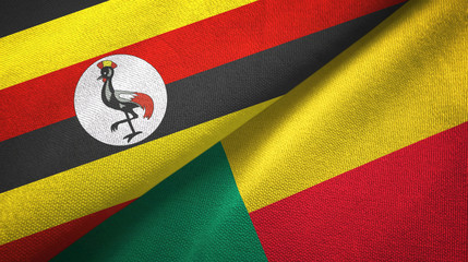 Fototapeta premium Uganda and Benin two flags textile cloth, fabric texture 