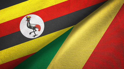 Fototapeta premium Uganda and Congo two flags textile cloth, fabric texture 