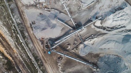 Aerial view of the granite - gravel pit. Equipment for processing and crushing stones