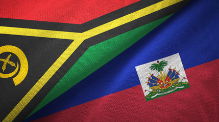 Fototapeta premium Vanuatu and Haiti two flags textile cloth, fabric texture
