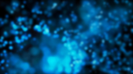 Abstract light blue blurred on black background