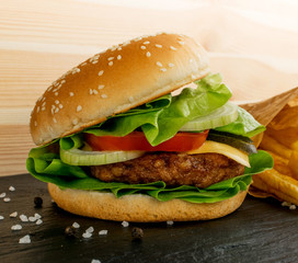 Burger with Roast Beef, Cheese and Fresh Green Lettuce Salad
