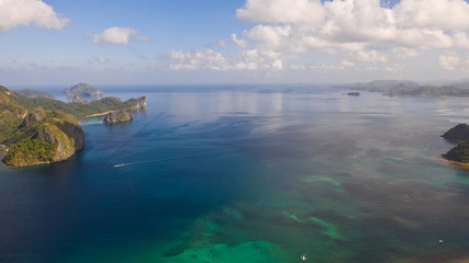 Seascape, view from above. Rocky islands covered with rainforest. El nido, Philippines, Palawan. Blue sea and the archipelago with tropical islands.