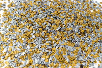 Gold and Silver Sprinkles Texture, Pattern or Background Top View