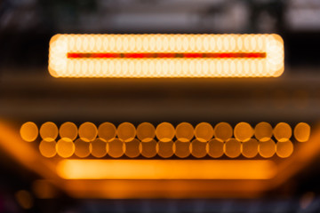 Illuminated globes on the marquee as often used at the entrance to theatres and casinos