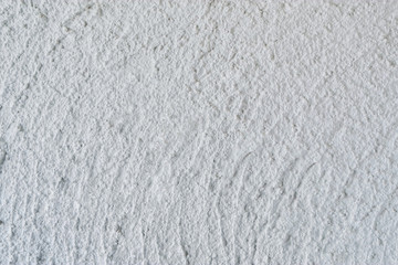 The white cement wall surface is a background, giving a clean feeling, suitable for use in design work.