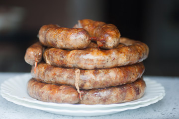delicious juicy baked sausages in the oven