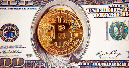 bitcoin on dollar bills (Investment, course change - concept)