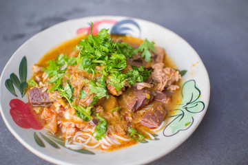 Nam Nguan Noodle, Rice noodles with spicy pork sauce.