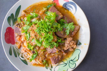Nam Nguan Noodle, Rice noodles with spicy pork sauce.