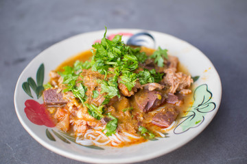 Nam Nguan Noodle, Rice noodles with spicy pork sauce.