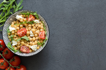 Healthy summer salad bowl top view with copy space