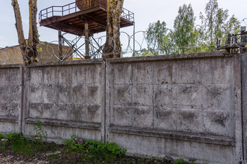 Concrete Wall with Razor Wire in Riga Latvia