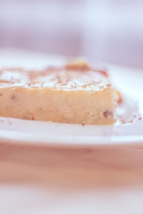 Cottage cheese casserole with condensed milk on a plate. Baking from cottage cheese.