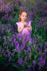 portrait smiling toddler girl in lavender field