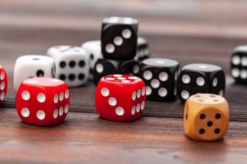 Dice on wooden table. Background for casino games.