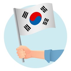 south korea flag in hand