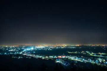 Naklejka premium Night city in the haze