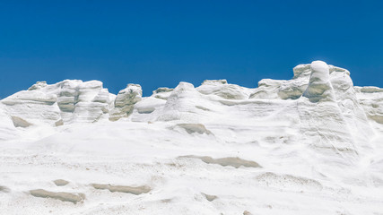 Milos Island Sarakiniko Volcanic White Stone Texture with Blue Sky