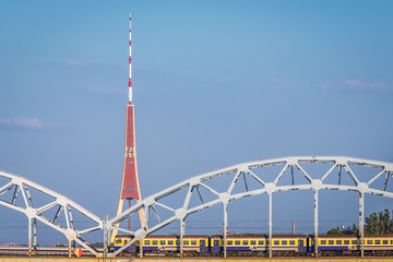 Obraz premium Radio and TV Tower and Railway Bridge in Riga city, Latvia