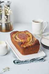 Whole Banana bread. Cake with banana, american cuisine. Side view, vertical