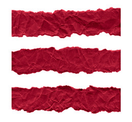 Scraps of dark red paper on a white background. Isolated on white. Ready frame for design, template. Torn paper