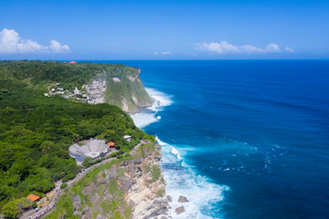 Fototapeta premium beautiful uluwatu cliff with blue sea in bali island