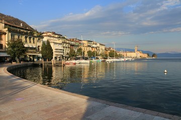 Fototapeta na wymiar Salò, Garda lake, Italy. The promenade of the city in front of the lake.
