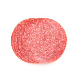 Salami slices on white background.