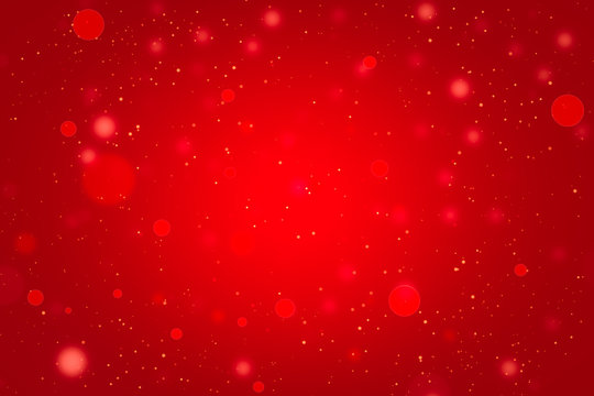 red Abstract background with glitter light bokeh blurred , red background, snow glowing texture on Christmas background holiday