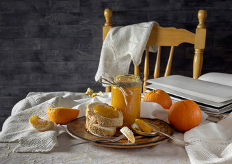 Breakfast of orange jam on rusks