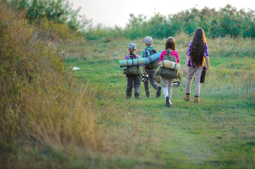 Fototapeta premium Boys and girls, go hiking with friends.