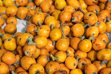Loquat fruit or Japanese medlar background. Eriobotrya japonica