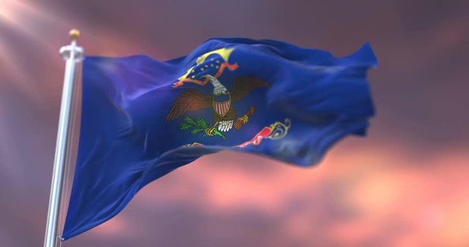 Flag of North Dakota state, region of the United States, waving at sunset - loop