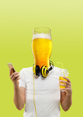 Male body with headphones and smartphone headed by a glass of beer against green background. Negative space to insert your text. Modern design. Contemporary art collage. Vacation, summer, resort.