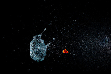 Balloon filled water bursting . Bomb water balloon with fantastic water splash .