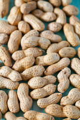 peanuts on wooden surface