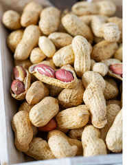 peanuts on wooden surface