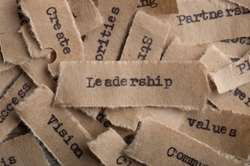 Leadership word on a piece of paper close up, business creative motivation concept