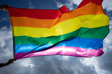 Colorful LGBT flag blows in the breez.