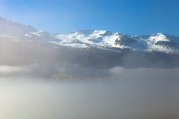 Foggy landscape of the fjords of Iceland