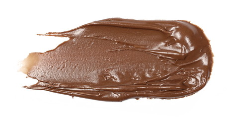Cream chocolate spread isolated on white background, top view