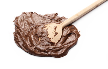 Cream chocolate spread with wooden spoon isolated on white background