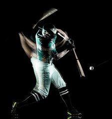 one caucasian baseball player man  studio shot isolated on black background with light painting speed effect