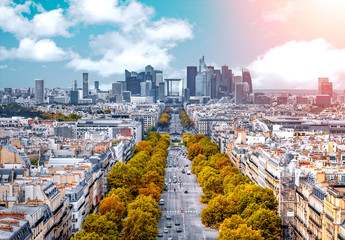 La Defense Financial District Paris France in autumn. Traffic on Champs-Elysees. Trees with orange...