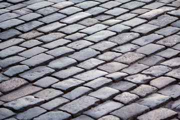 Urban stone paving stones. Backgrounds and textures
